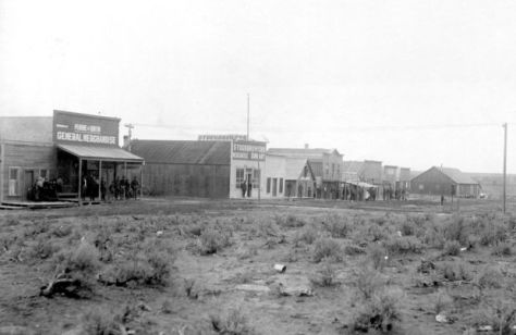 In this photo by an unknown photographer, townsfolk are seen in front of Perrine and Burton General Merchandise building on a main street of Milner in 1904. PHOTO COURTESY TWIN FALLS COUNTY HISTORICAL MUSEUM